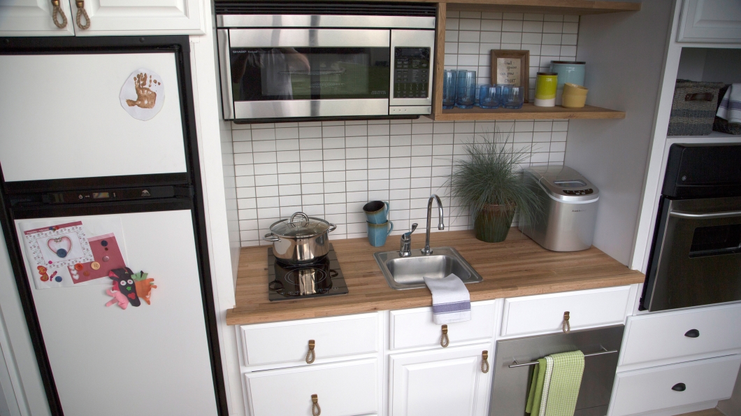 john and zack managed to fit a full kitchen into this tiny space
