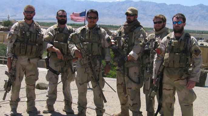 Matthew G. Axelson, Daniel R. Healy, James Suh, Marcus Luttrell, Eric S. Patton and Michael P. Murphy pose in Afghanistan on June 18, 2005. Ten days later, all but Luttrell would be killed by enemy forces while supporting Operating Red Wings, which also claimed the lives of Danny Dietz and 13 other Navy Seals. (Credit: U.S. Navy via Getty Images)