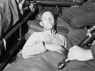 William Joyce, aka "Lord Haw-Haw," under arrest in 1945.