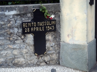 Cross marking the execution location.