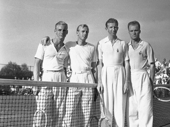 Hunt (left) with doubles partner Sidney Wood and opponents at the men's doubles championship of the Eastern Lawn tennis tournament, 1938. (Credit: Bettmann/Corbis