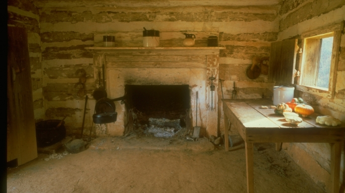 Reconstruction of the cabin where Washington lived with his mother, now part of the Booker T. Washington National Monument. (