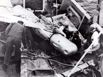 Recovered bomb number four being displayed after its retrieval from the sea. (Credit: Public Domain)