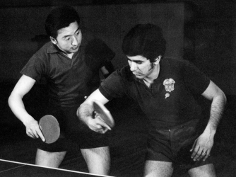 An American tennis table player trains with a Chinese tennis table player, in April, 1971 in Beijing, China. (Credit: AFP/Getty Images)