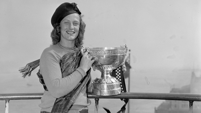 Babe Didrikson Zaharias with the Birtish Women's Amateur Championship Cup which left England for the first time. (Credit: Walter Engels/NY Daily News Archive/Getty Images)