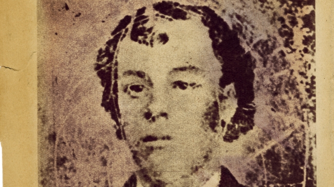 An image of Billy the Kid from his 1877 wanted poster. (Credit: Fototeca Gilardi/Getty Images)