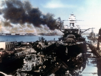 The battleship USS Pennsylvania (center right), sits in drydock at Pearl Harbor, amid the ruins of the USS Cassin and USS Downes, after the Japanese attack, Honolulu, Oahu, Hawaii, December 7, 1941. (Credit: US Navy/Interim Archives/Getty Images)