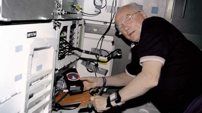 STS-95 payload specialist John Glenn aboard the space shuttle Discovery in November 1998. (Credit: NASA)