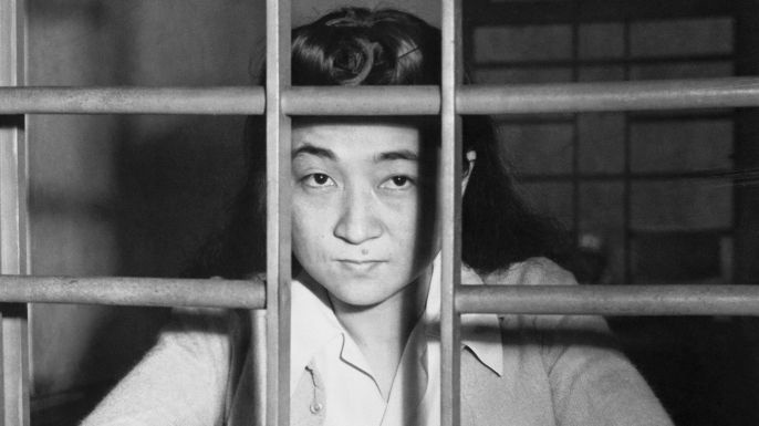 Iva Toguri, better known as Tokyo Rose, has plenty of time for reflection on her crimes here, as she waits in her jail cell in Yokohama for her upcoming trial for treason. (Credit: Bettmann/Getty Images)