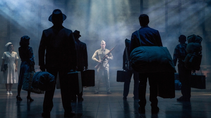 A still from the musical "Allegiance." depicting the arrival of Japanese Americans at an internment camp. (Credit: Matthew Murphy/Fathom Events)