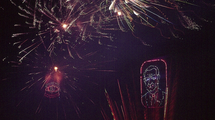 A fireworks display celebrates the 56th birthday of Lyndon Johnson at the 1964 Democratic National Convention.