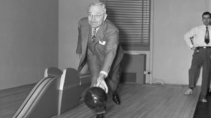 President Harry Truman bowls at the newly-installed White House bowling alley. (Credit: Marion Carpenter/Getty Images)