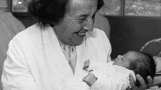 Dr. Gisella Perl with a newborn.