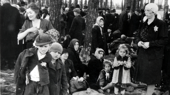 The arrival of Hungarian Jewish people to Auschwitz-Birkenau in 1944. Gisella Perl was sent to Auschwitz from Hungary. Most were sent immediately to the gas chambers by Dr Josef Mengele. (Credit: Galerie Bilderwelt/Getty Images)