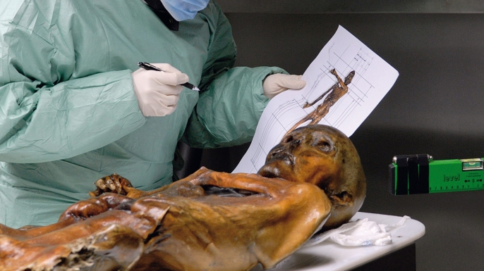 Scientific examination of the frozen mummy. (Credit: South Tyrol Museum of Archaeology/EURAC/Samadelli/Staschitz)