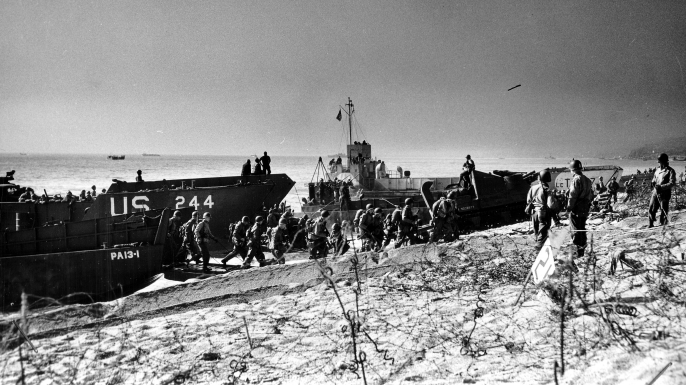 Troops coming ashore Slapton Sands during the exercise. (