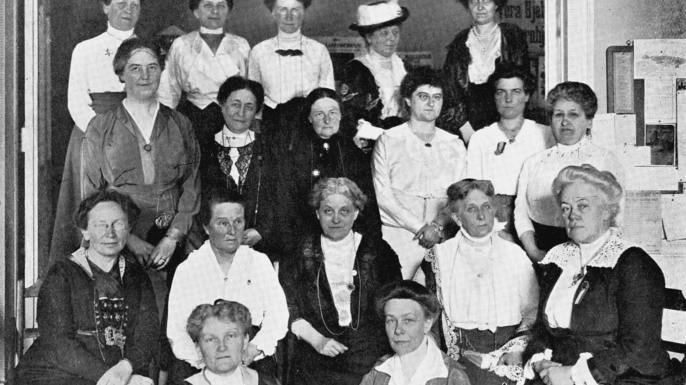 International Woman Suffrage Alliance, 1914. In centre of seated row is Carrie Chapman Catt, American feminist leader. 2nd from left Millicent Garrett Fawcett. (Credit: Ann Ronan Pictures/Print Collector/Getty Images)