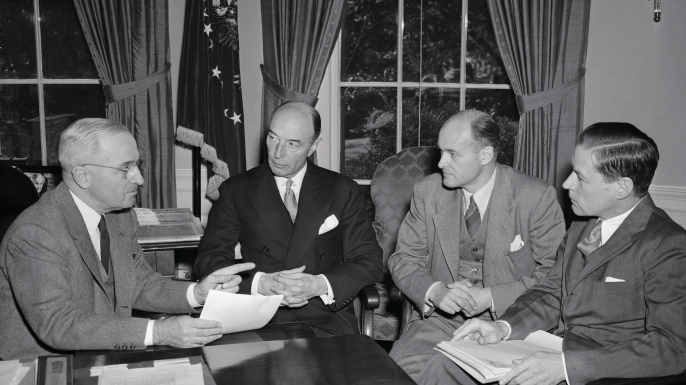 President Truman with Undersecretary of State Robert Lovett; George F. Kennan, Director of the Policy Planning Staff of the State Department; Charles E. Bohlen, special assistant to Secretary Marshall. (Credit: Credit: Bettmann / Getty Images)