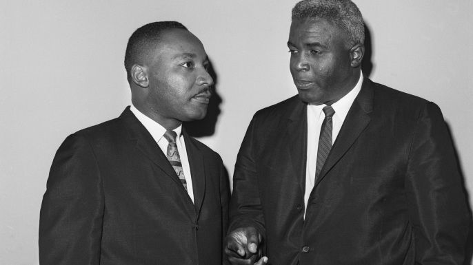 Martin Luther King, Jr and Jackie Robinson at a 1962 press conference.