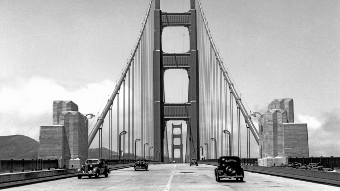Press cars going across the about to be opened new Golden Gate Bridge, in May 1937. (Credit: Underwood Archives/Getty Images)