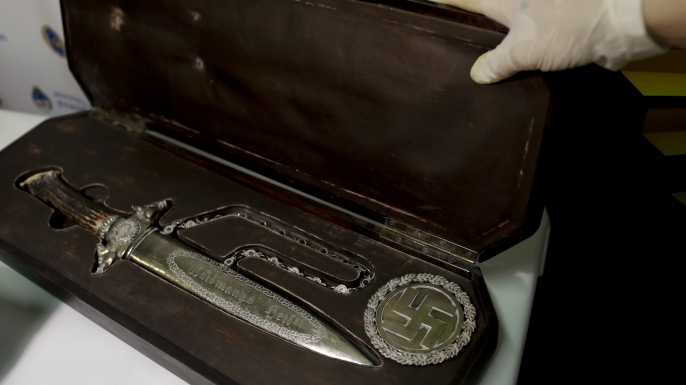 A knife with Nazi markings is seen at the Interpol headquarters in Buenos Aires, Argentina. (Credit: Natacha Pisarenko/ AP Photo)