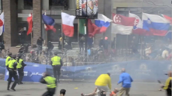 Still from Ryan Hoyme's video of the second bomb exploding at the Boston Marathon. (Credit: Ryan Hoyme)