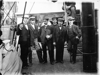 The scientific staff on the ship before sailing south from Australia. From left: Nicolai Hanson, William Colbeck, Herlof Klovstad, Anton Fougner, Louis Bernacchi. (Credit: Antarctic Heritage Trust)