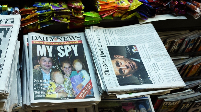 New York newspapers, one featuring Richard and Cynthia Murphy, at a news stand in New York, 2010. (Credit: Emmanuel Dunand/AFP/Getty Images)