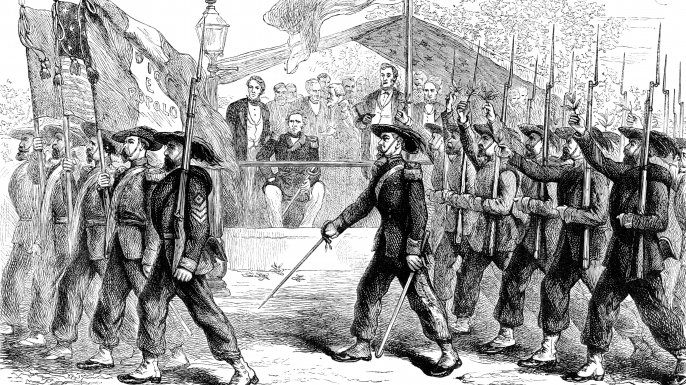 March past of the 'Garibaldi Guard' before President Lincoln. The 'Garibaldi Guard' was the nickname given to the 39th New York Volunteer Infantry Regiment that fought in the American Civil War. Many of the regiment's members were Italian Americans who had served under Giuseppe Garibaldi in Italy. (Credit: The Print Collector/Print Collector/Getty Images)