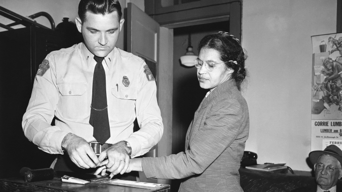Rosa Parks being fingerprinted by police after refusing to give up her seat on the bus to a white man. (Credit: Gene Herrick/AP/REX/Shutterstock)