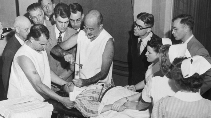 Dr. Walter Freeman performing a lobotomy. (Credit: Bettmann/Getty Images)