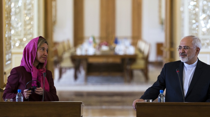 EU foreign policy chief Federica Mogherini (left) and Iranian Foreign Minister Mohammad Javad Zarif (right) take part in a press conference following their talks in the capital Tehran on July 28, 2015. (Credit: BEHROUZ MEHRI/AFP/Getty Images)