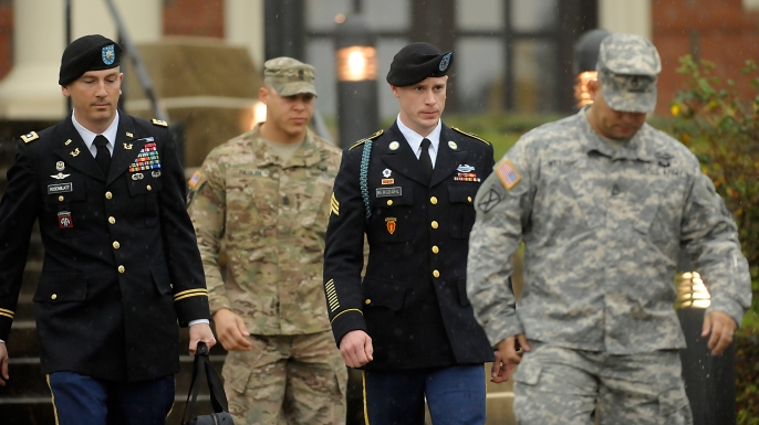 U.S. Army Sgt. Bowe Bergdahl (second from right) leaves a military courthouse with his attorney Lt. Col. Franklin Rosenblatt (left) on December 22, 2015, in Ft. Bragg, North Carolina. Bergdahl following his arraignment on charges of desertion and endangering troops stemming from his decision to leave his outpost in Afghanistan in 2009.