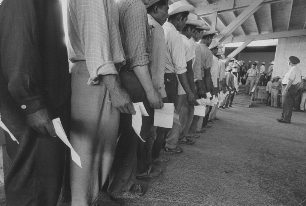 Mexican migrant farm workers lined up for job interviews and to sign contracts at reception center. Until the mid-20s, the growth of the Mexican population in the United States had been attributed mainly to immigration of men looking for work. But with the increased arrival of Mexican women, restrictionists began to focus on birth rates among the immigrant population.