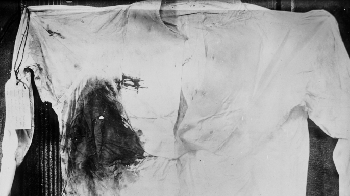Bloodstained shirt worn by President Theodore Roosevelt, photographed following an assassination attempt in Milwaukee, Wisconsin, 1912. (Credit: Harlingue/Roger Viollet/Getty Images)