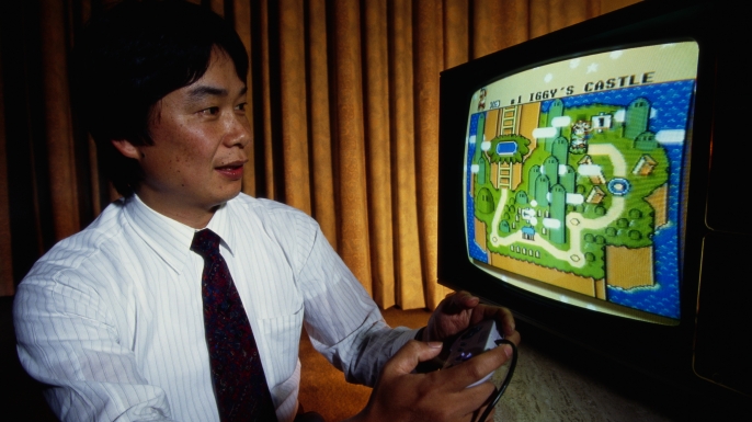 Shigeru Miyamoto, creator of Mario and other characters and video games for Nintendo, plays Super Mario World on a Nintendo Super NES System. (Photo by © Ralf-Finn Hestoft/CORBIS/Corbis via Getty Images)
