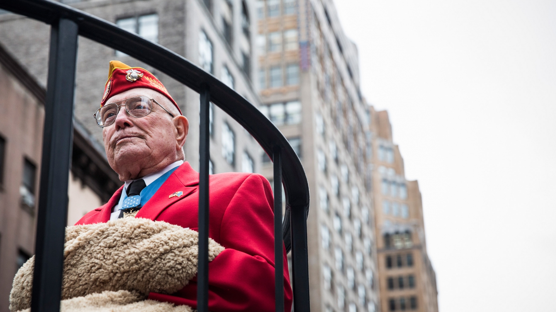 United States Marine Hershel "Woody" Williams riding on a float during the Veteran's Day Parade in New York City, 2013. (Credit: Andrew Burton/Getty Images)