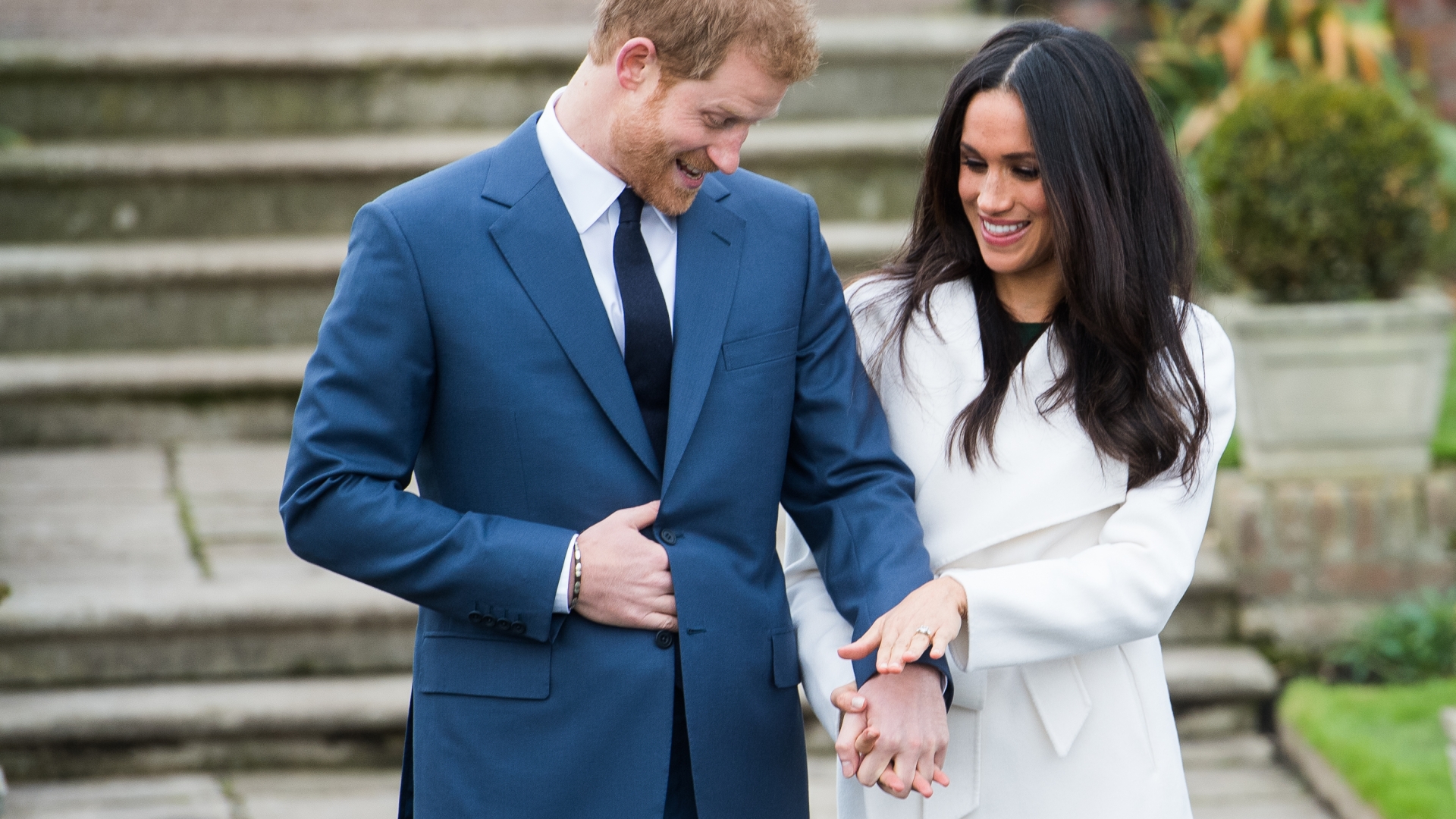Prince Harry and Meghan Markle announcing their engagement at the Sunken Gardens at Kensington Palace, November 27, 2017. (Credit: Samir Hussein/Samir Hussein/WireImage)