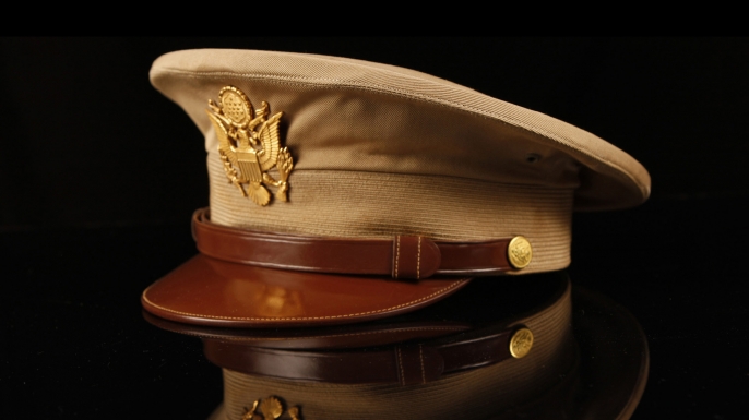 Father Emil Kapaun’s military cover on display at Kapaun Mt. Carmel High School in Wichita, Kansas. (Credit: Bo Rader/Wichita Eagle/MCT via Getty Images)
