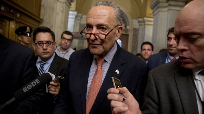 Senator Chuck Schumer of New York speaking with reporters as he leaves Capitol Hill in Washington, just after Trump tweeted that the driver in the October 31, 2017 New York attack "came into our country through what is called the 'Diversity Visa Lottery Program,' a Chuck Schumer beauty". (Credit: AP/REX/Shutterstock)