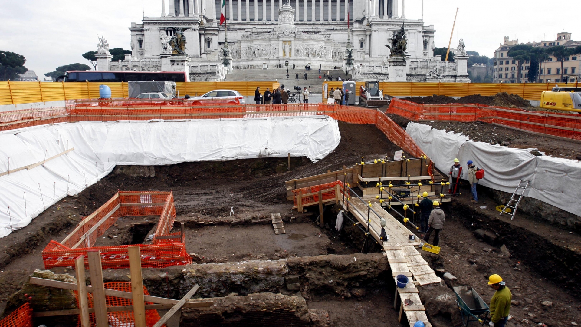 Archaeologists working in an archaeological dig in Rome's central Piazza Venezia Square in 2007, in preparation for a new subway line, where a sixth-century copper factory have been found. (Credit: Alessandra Tarantino/AP Photo)