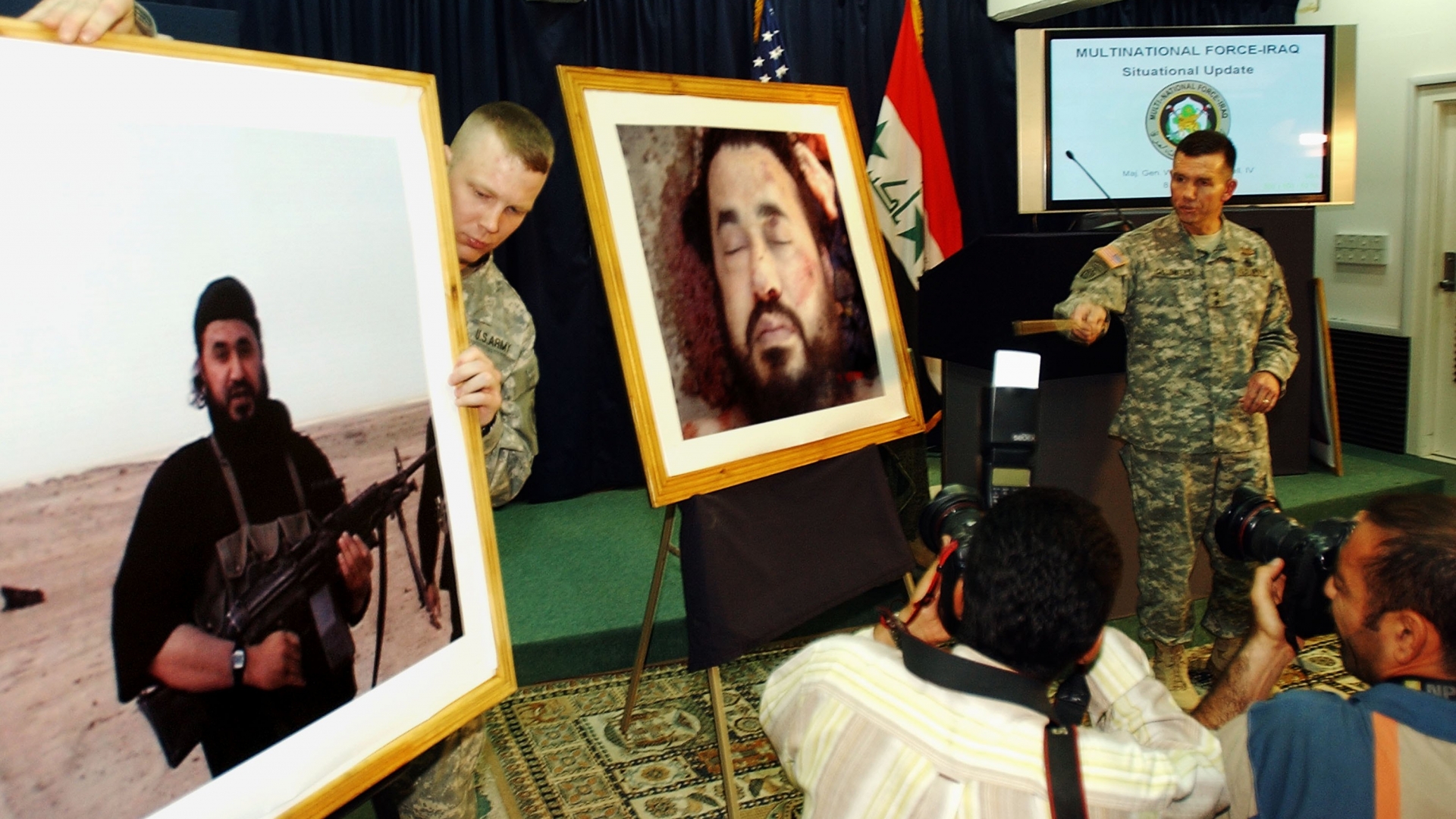 A press conference announcing the death of Abu Musab al-Zarqawi, the leader of al-Qaeda in Iraq. Former CIA tracker Nada Bakos was an instrumental member of the team that found the notorious terrorist. (Credit: Wathiq Khuzaie/Getty Images).