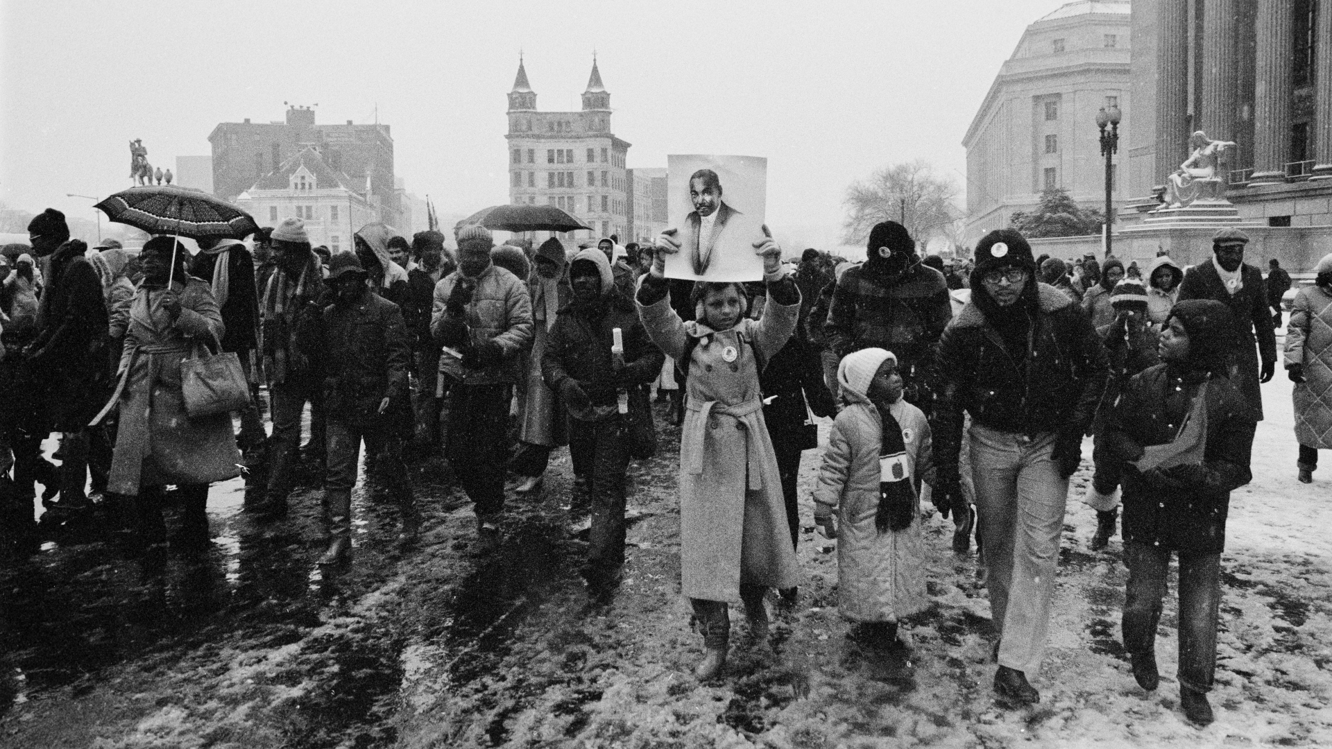 A march down Pennsylvania Avenue publicly campaigning for Martin Luther King, Jr's birthday to be made a national holiday in the US, January 15, 1981. (Credit: Jonathan C. Katzenellenbogen/Getty Images)