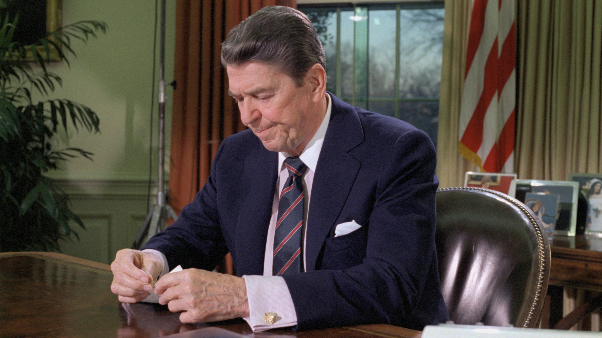 President Ronald Reagan in the Oval Office addressing the nation on the space shuttle Challenger disaster. (Credit: Bettmann Archive/Getty Images)