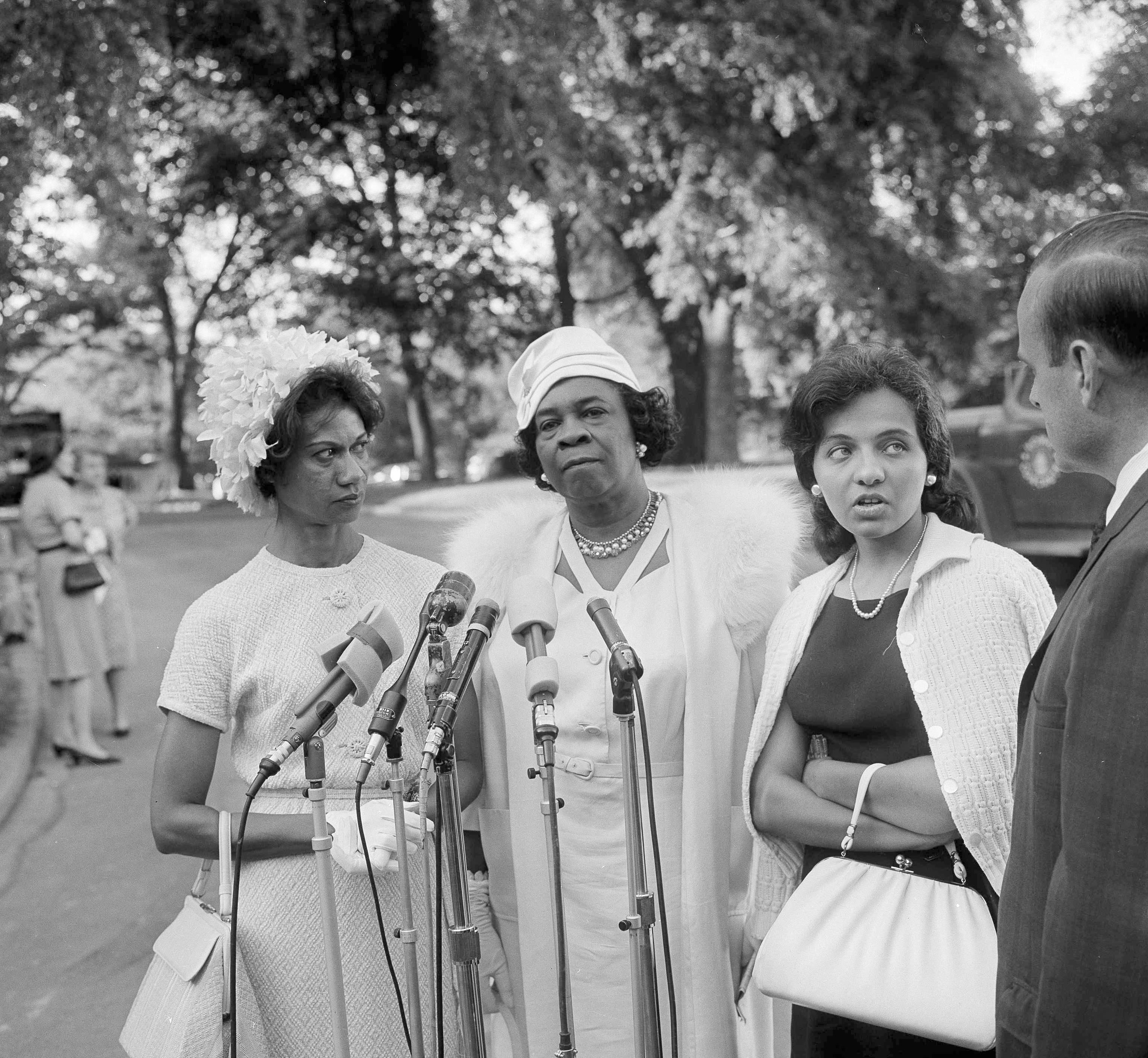 Gloria Richardson, Dr. Rosa L. Gragg and Diane Nash being interviewed after attending the White House to meet with President John F. Kennedy. He had asked 300 representatives of Women's organizations to back his civil rights program to help solve the racial problems. (Credit: Henry Burroughs/AP Photo)