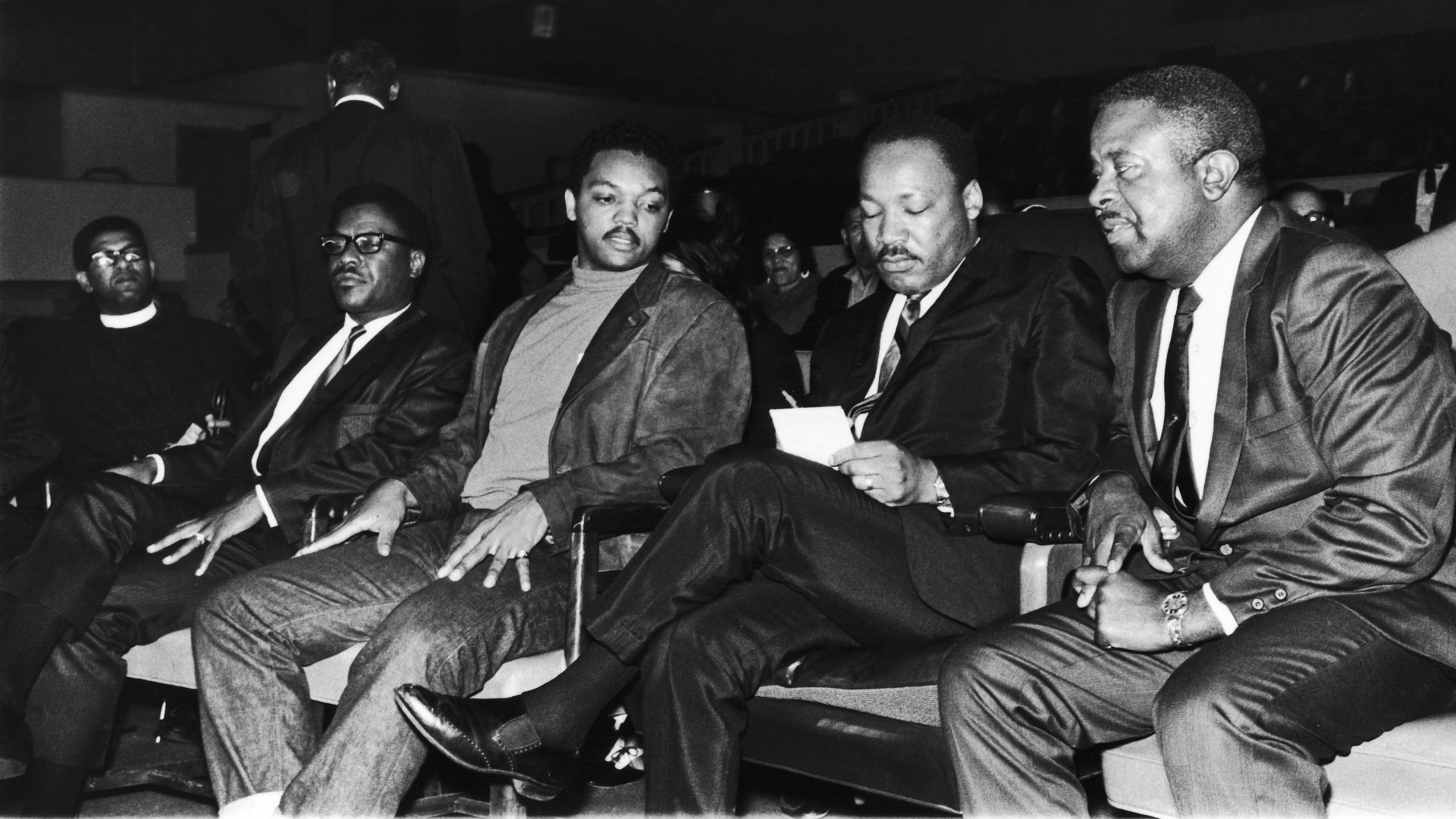 Jesse Jackson sitting on Martin Luther King, Jr.'s right-hand side, while looking over notes before King's famous 'Mountaintop' speech, which would be his last. (Credit: Maurice Sorrell/Ebony Collection via AP Images)