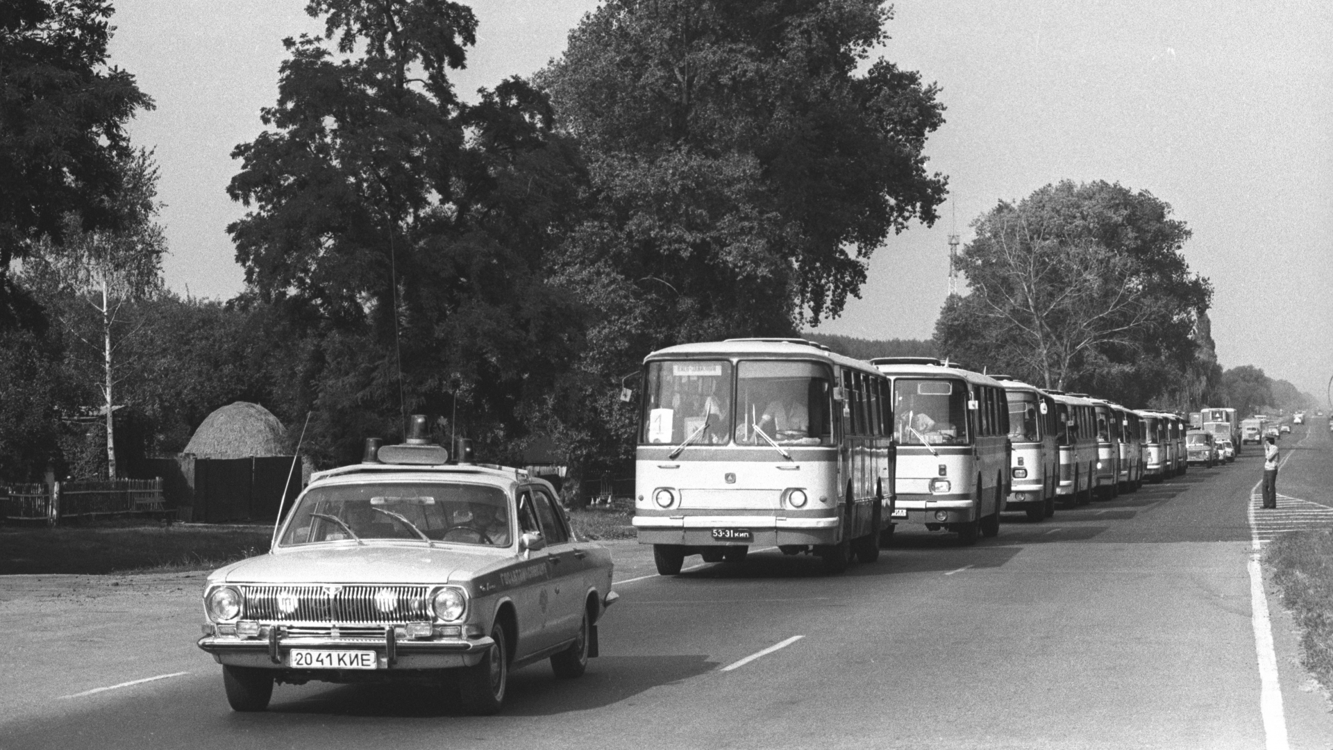 The evacuation of 47,000 inhabitants of Prypiat took place via 1,200 buses and 200 lorries. Locals were told to take few personal belongings and identity papers, to quickly evacuate as it was thought they would be returning several days later, which was not the case. The buses spread radiation to other locations. (Credit: Igor Kostin/Sygma/Getty Images)