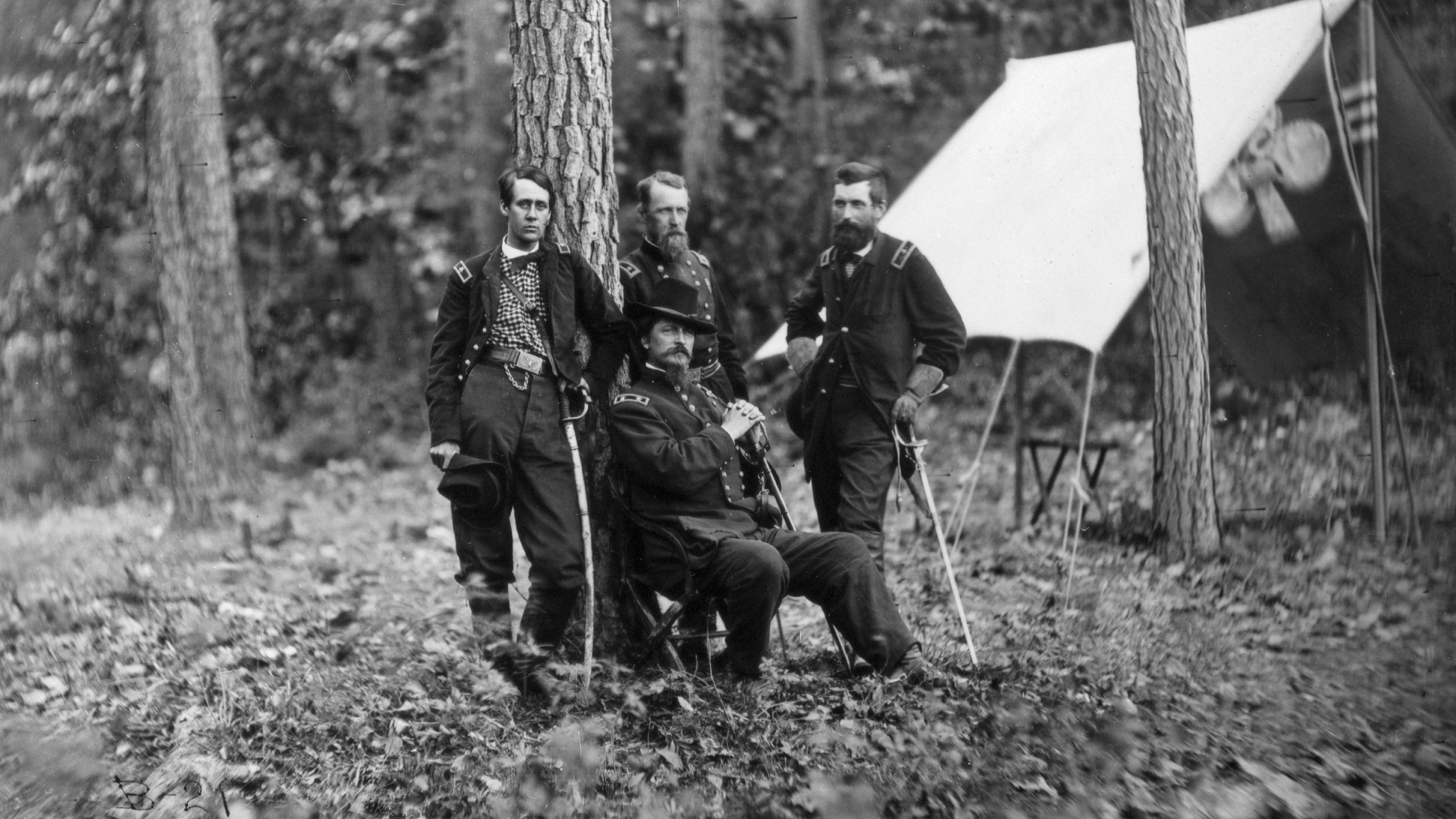 Portrait of General Winfield Scott Hancock (1824-1886), a Federal officer during the American Civil War, with members of his staff. Left to right are Generals Francis C. Barlow, David B. Birney, Winfield S. Hancock (seated), and John Gibbon. Each of these officers was wounded during the Battle of Gettysburg. (Photo by © CORBIS/Corbis via Getty Images)