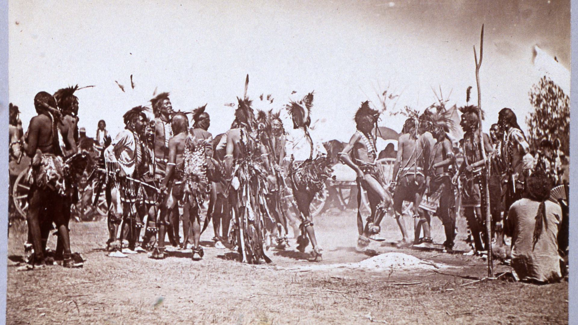 At the 10-year memorial of the Battle of Little Bighorn, unidentified Lakota Sioux dance in commemoration of their victory over teh United States 7th Cavalry Regiment (under General George Custer), Montana, 1886. The photograph was taken by S.T. Fansler, at the battlefield's dedication ceremony as a national monument. (Photo by Transcendental Graphics/Getty Images)