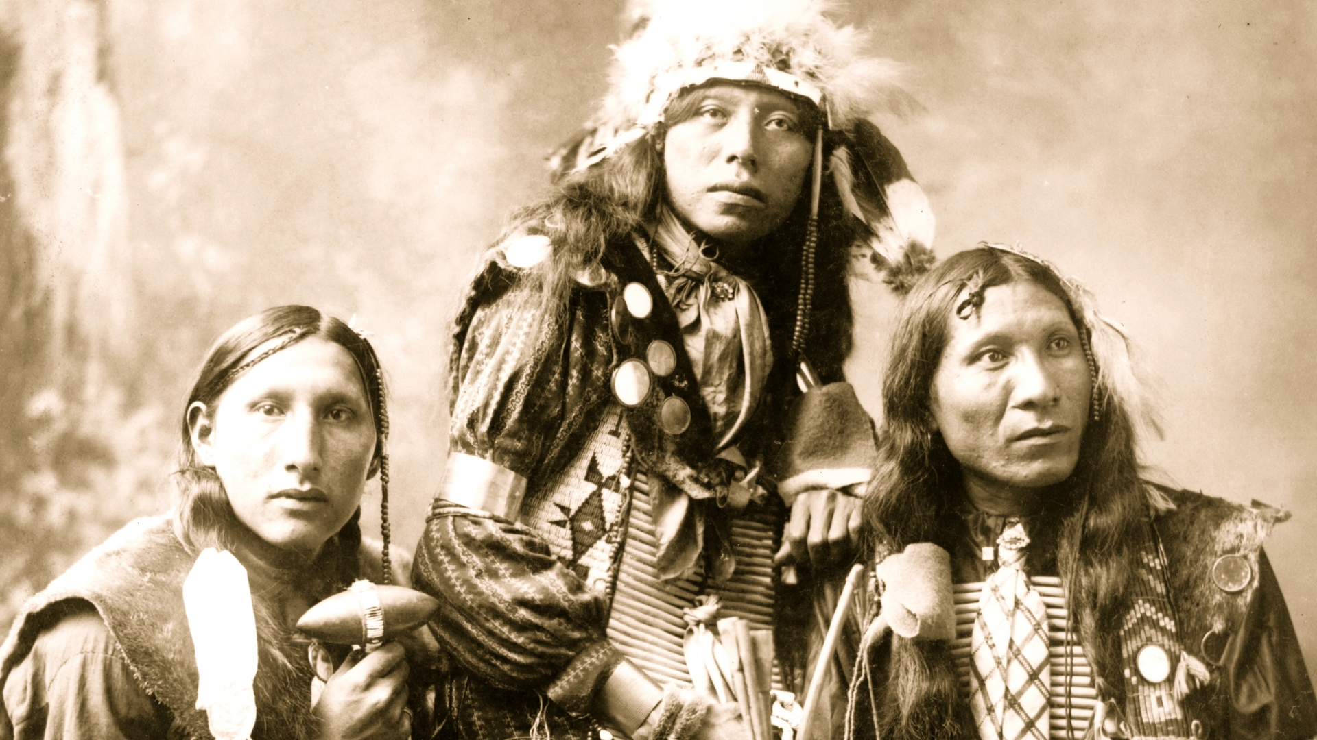 Three young Native American men, probably Sioux, wearing native accessories, 1899. (Photo by Heyn/Buyenlarge/Getty Images)
